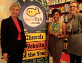 Ruth Morris accepts the award from Pam Rhodes and Kathryn Corrick