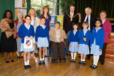 Two Mayors with staff and children