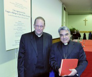 Fr Paul Chavasse with Bishop Marcello Semeraro atlaunch, with copy of the 'Positio' on miraculous healing of Deacon Jack Sullivan