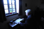 Deacon Sullivan at Newman's desk