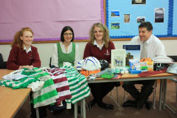 L-R Sophie Le Breton, Mrs Ruth Crossley, Natalie Crouch,  Mr Paul Warrilow, with some of the gifts they will be taking 