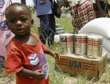 child at feeding station last summer