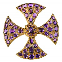 A morse (a clasp for a cape) set with 61 amethysts. Made in 1890 it was presented by Mrs Crawford in 1895. Used during installation of an archbishop.
