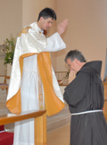 Fr Michael blesses his uncle. Picture: Jozef Lopuszynski