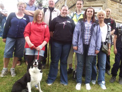   Bishop Terry, second left at back with Fr John Loughlin, with young people from Sacred Heart parish, Mike Morrissey, sheepdog Jess