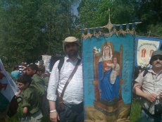 Dr Shaw with Our Lady of Walsingham banner on Paris to Chartres pilgrimage, May 2010.