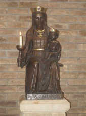The Statue of Our Lady of the Taper holding the infant Christ, was specially gilded for the Papal blessing.
