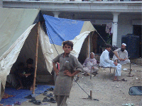 Flood survivors camp out in tents