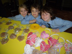 St Vincent's children display heart-shaped presents