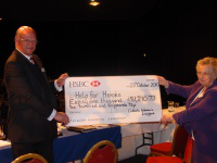David Gammell from Help for Heroes receives cheque from Doreen Pooley