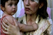 Mother and child after attack - photo: ICIN