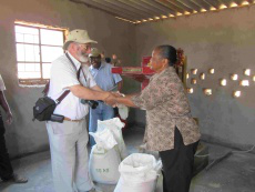 Handing over ceremony with Hugh de Robeck Prior SLJ and Rose Chiota, Chairman Mutemwa Leprosy Trust