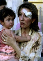 Mother and child after attack on Our Lady of Salvation church - photo: ICIN