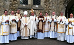 Bishop Hine with the new Deacons
