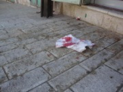 blood-soaked pavement