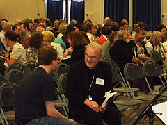 Archbishop George Stack chats with catechist