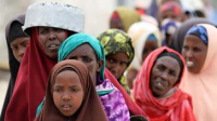 Somali women queue for food - image CAFOD