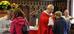 Pilgrims being anointed