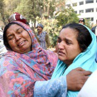 Grieving women in Pakistan where Christians are being punished under Blasphemy Laws