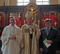 Bishop John Arnold, Archbishop  Vincent Nichols, with CAFOD director Chris Bain,  before the Mass