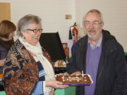 Convener Sylvia Lucas with Fr Wilfrid McGreal & birthday cake