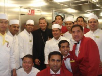 Happier days - Bishop Joseph Kalathiparambil, secretary of the Pontifical Council for Migrants on visit to the ship a few months ago