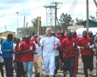 John McBride runs through Korogocho