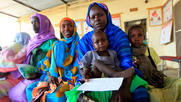 waiting in clinic - image CAFOD
