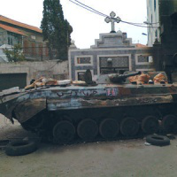 Tank in front of church - pic ACN