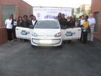 Staff, pupils, Margaret & Barry Mizen and Dianne Abbott MP with Peace Car