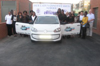 Staff, pupils, Margaret & Barry Mizen and Dianne Abbott MP with Peace Car
