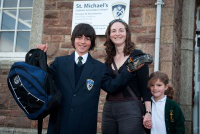 Peter Furbank, 11, was first through the school gates with his mum Kathryn Furbank and sister Paige, aged 6. Photo: Paul Richards