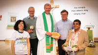 parishioners with parish priest Fr Chris Whelan  & Cafod director Chris Bain