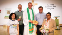parishioners with parish priest Fr Chris Whelan & Cafod director Chris Bain