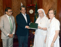 Governor Ishrat ul Ebad  presents papers to Sisters at Government House
