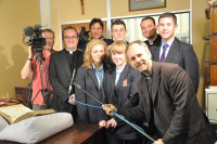 students with film crew