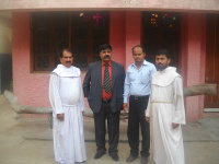 Fr Mohan, curate, Saleem & Shamim