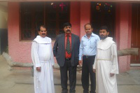 Fr Mohan, curate, Saleem & Shamim