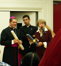 Bishop Luis Henrique, of Rio de Janeiro with Brazilian chaplain, receives Icon copy from Barbara Kentish