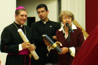 Bishop Luis Henrique, of Rio de Janeiro with Brazilian chaplain, receives Icon copy from Barbara Kentish