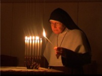 lighting candles at Matins