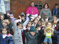 Bishop Sherrington with Holy Family staff, parents & children