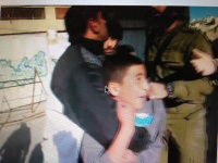 Boy being arrested (screen shot)