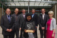 Muna Hassan with Nick Batchelar, Dr Mervyn Davies, Peter Bradshaw, Derek Bodey and Ann Barrow.