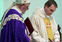 Happier times: Bishop Patrick inducts Fr Michael as parish priest - Feb 2013