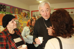 Archbishop Vincent speaks with families