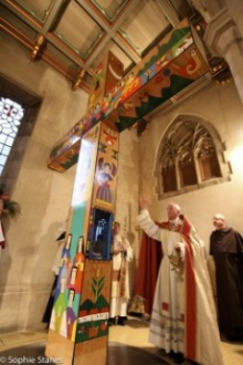 Archbishop Smith blesses Romero Cross - image Sophie Stanes