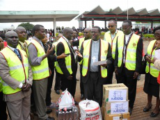 Bishops distributing aid