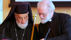 Patriarch Gregorios III with Dr Rowan Williams at launch in Parliament