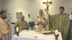 Archbishop Nassar (2nd left) during Mass at ACN headquarters in Germany last week